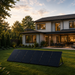 Nature's Generator 440W monocrystalline solar panels mounted on a ground rack for residential renewable energy