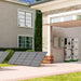 Nature's Generator MyGrid 10K installed inside a modern home garage providing whole-home backup power with solar panel charging and extension batteries