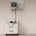 Installed Nature's Generator Powerhouse Gen 2 and Power Pod Expansion Battery connected to a home's electrical system using a transfer switch