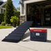 Dakota Lithium PS2400 Solar Generator Kit powering devices outside a home